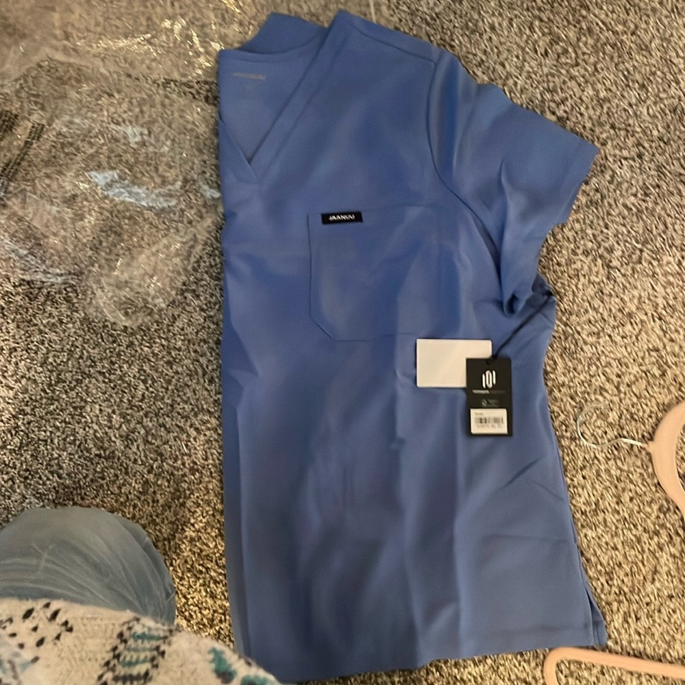 never worn Jaanuu scrubs light blue